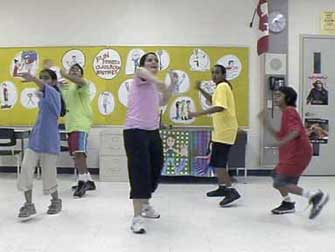 Serving an Imaginary Tennis Ball in the “Favorite Sport Routine”