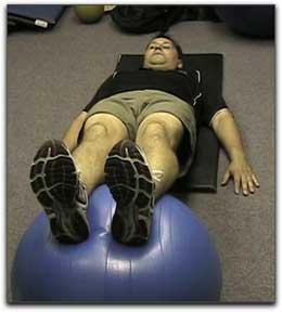 Strength (Video): Exercise Ball Hamstring Curls
