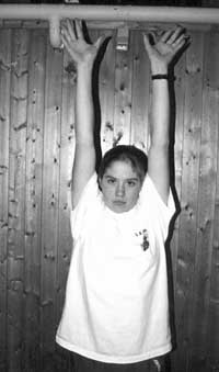 Player Locks the Arms By 
Shrugging the Shoulders Upward